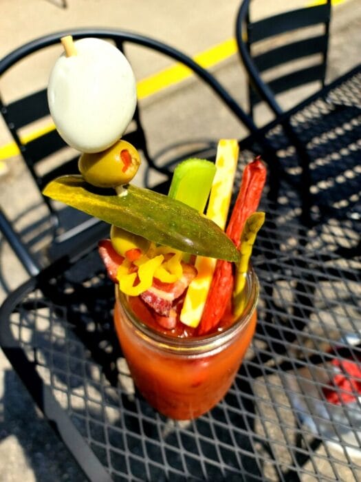 loaded bloody mary on patio table