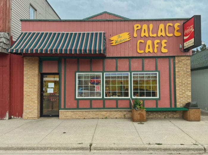 outside building called palace cafe