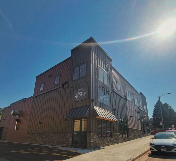 outside building on corner with sunshine