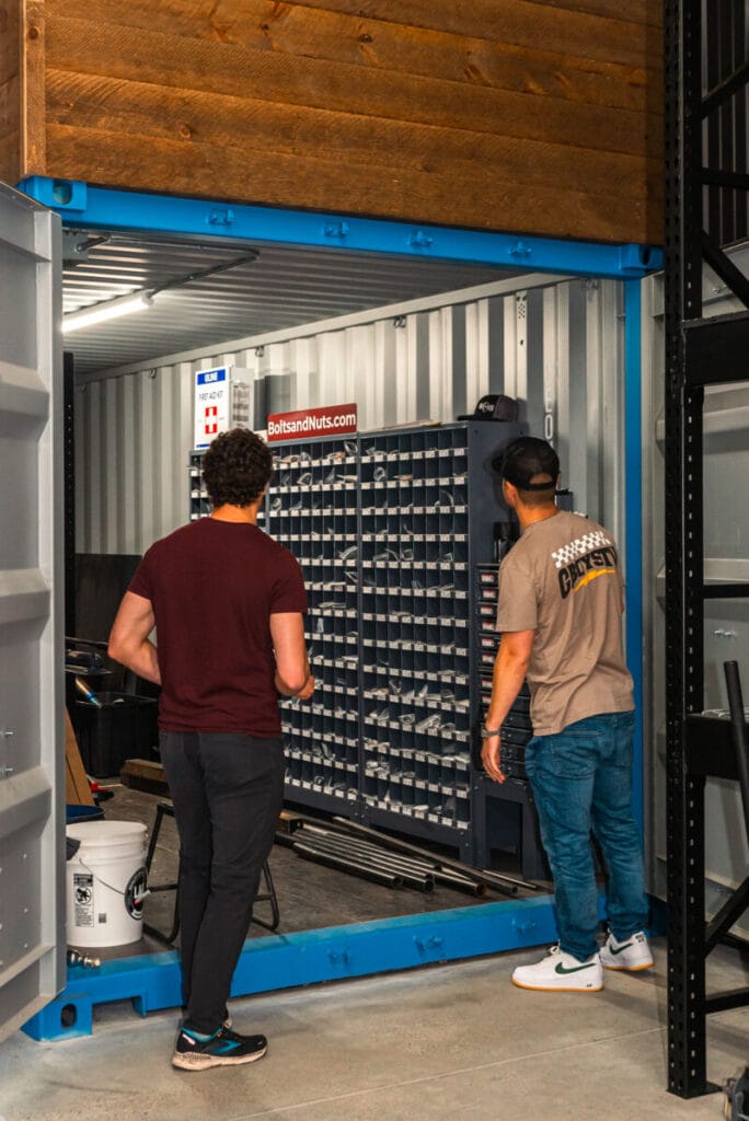 two men looking at tools