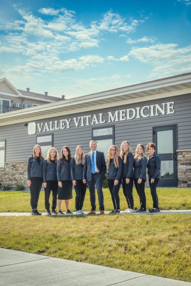 group in front of medical building