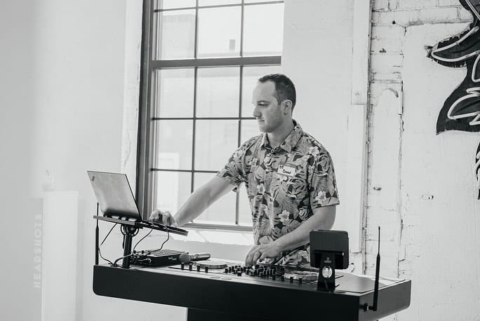 black and white man at dj set