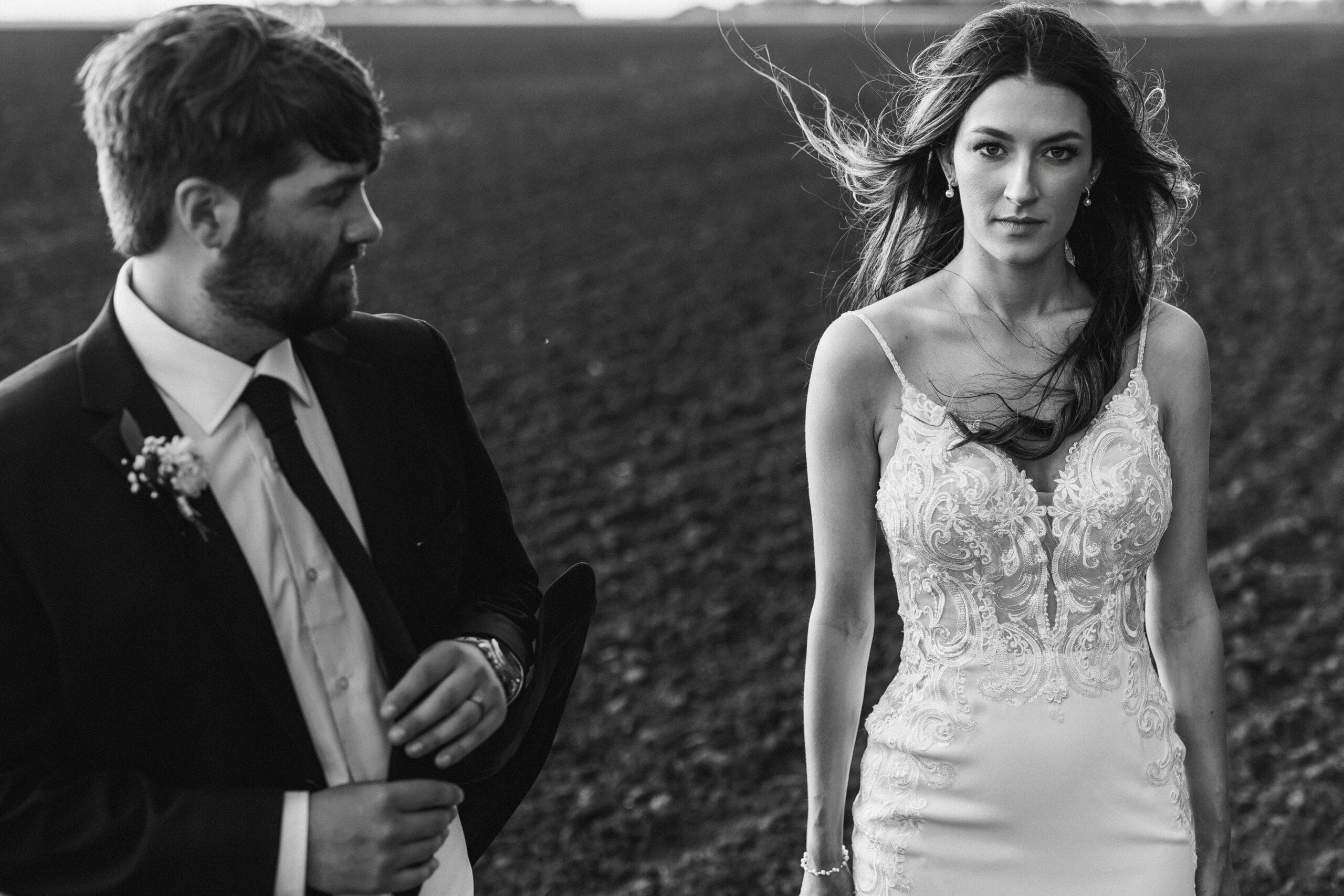 black and white photo of couple on wedding day scaled