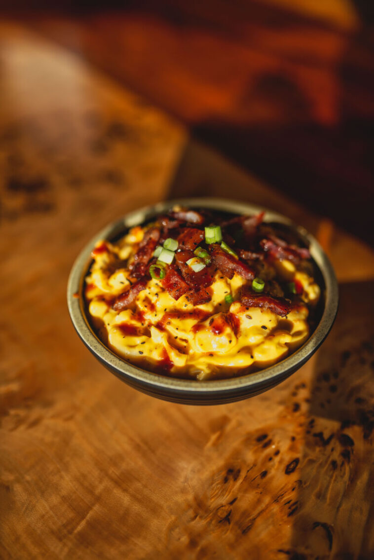bowl of macncheese with toppings